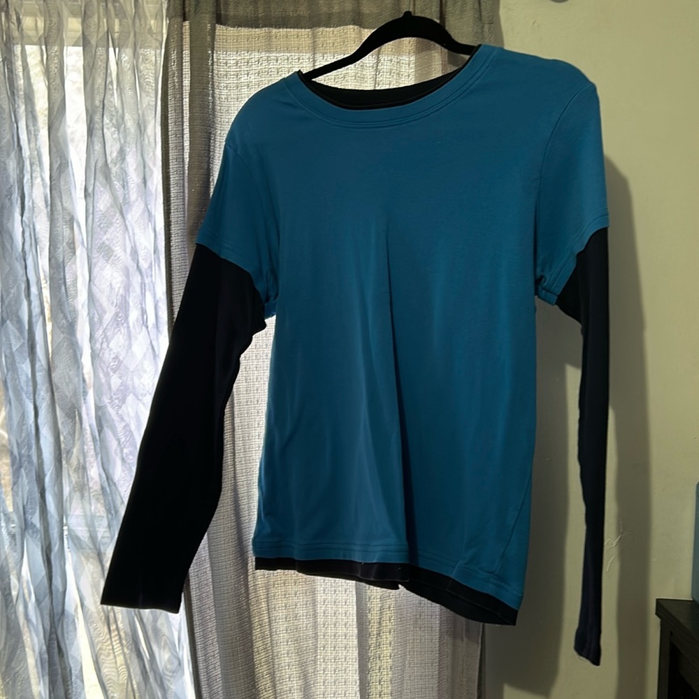 selling a two-shaded blue long sleeve shirt! brand is sjbactive! brand new!
